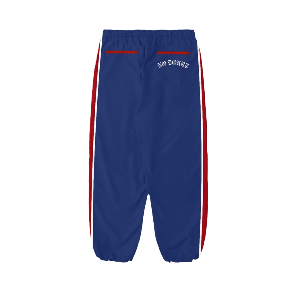 Blue unisex trackpants feature No Doubt logo art on back right pocket, with red and white stripes down the side of each leg.